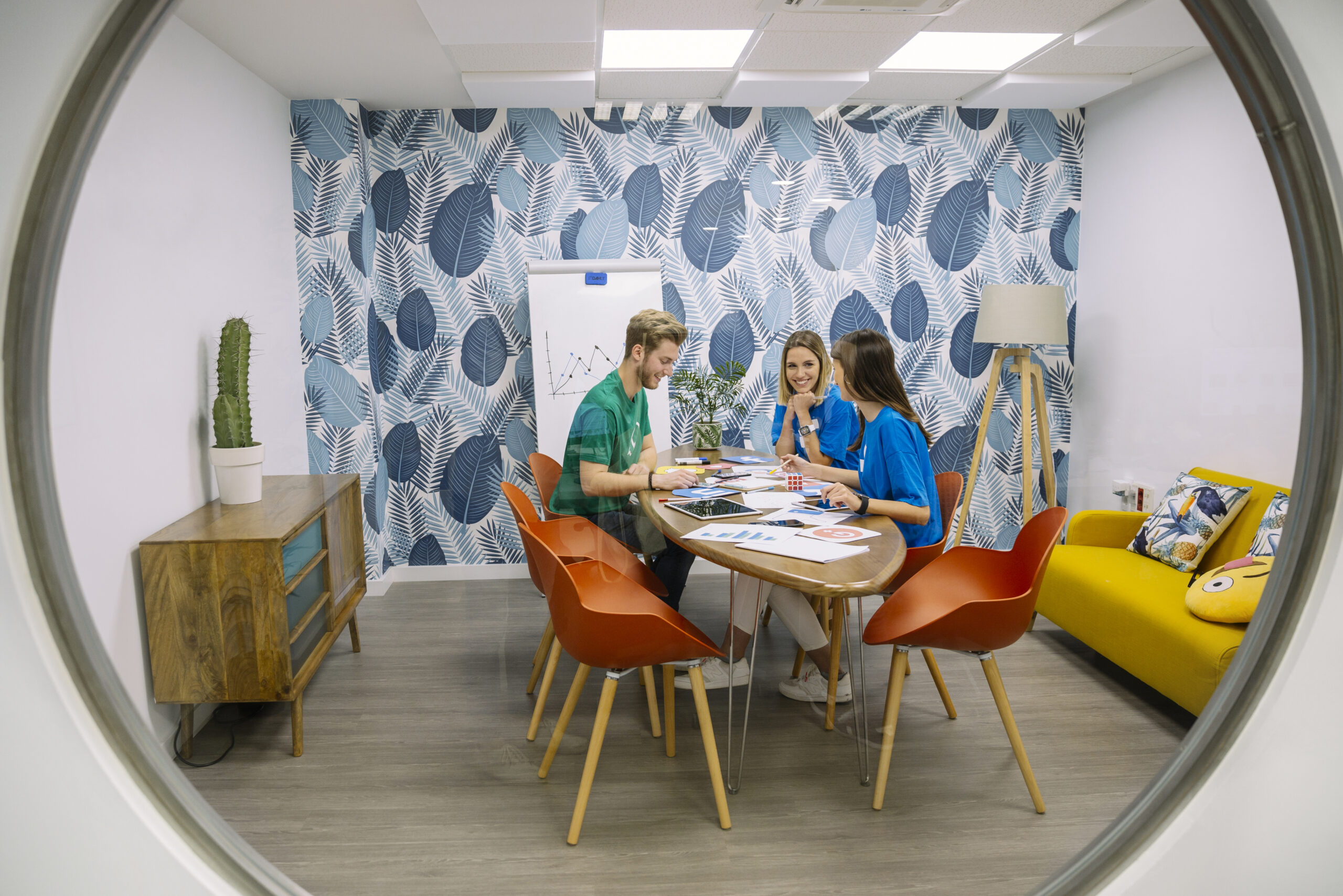 social-media-team-having-discussion-luxury-workplace